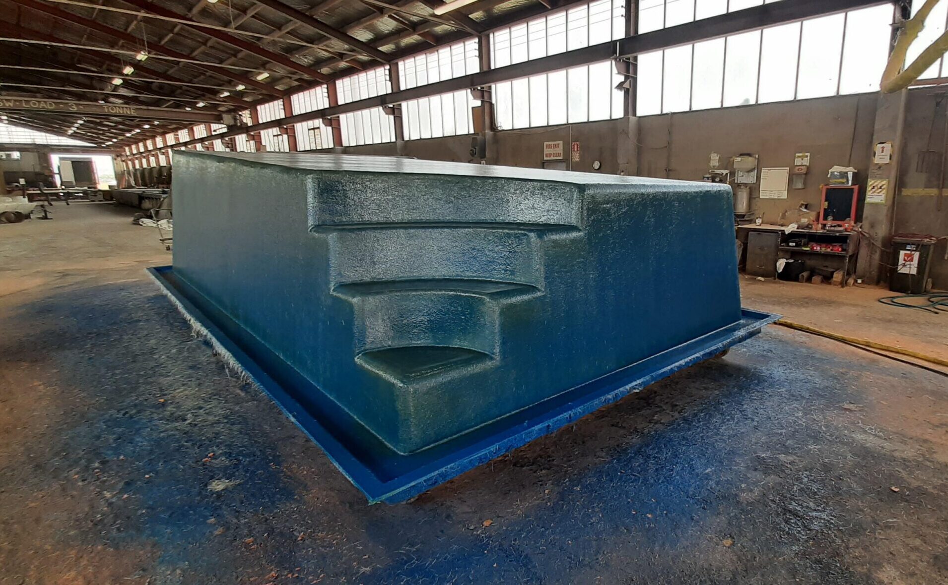 A fibreglass pool being manufactured in the Bermuda Pools Christchurch Factory