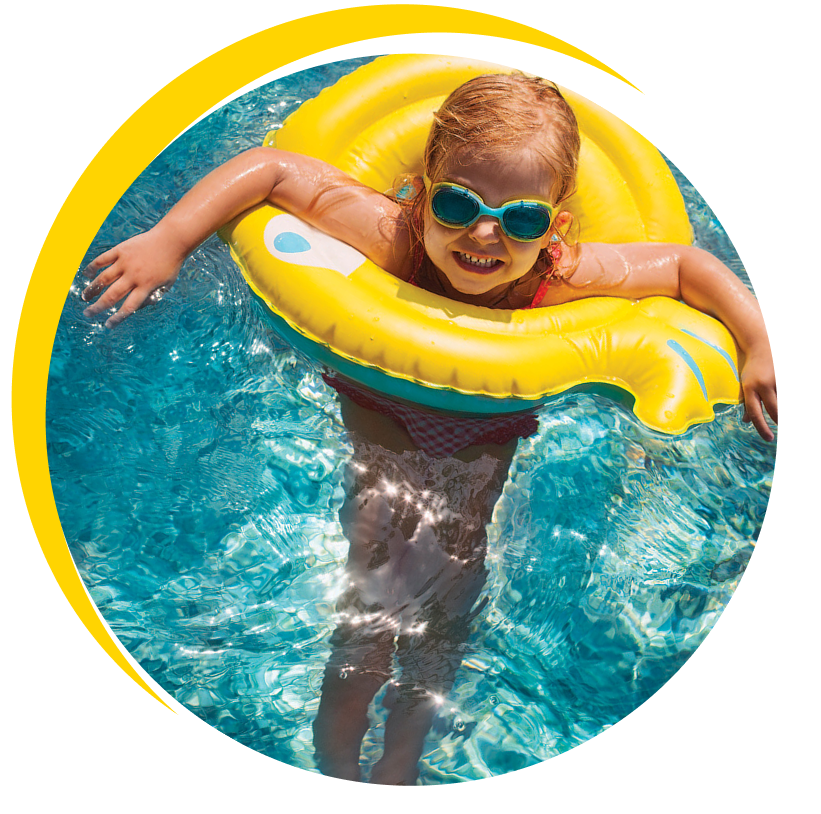 Young girl floating in a swimming pool
