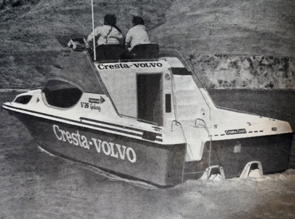 Cresta-Volvo amphibious boat on water with two people riding, designed for versatility and adventure.