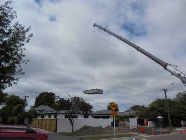 Bermuda Pool being lifted in place by crane